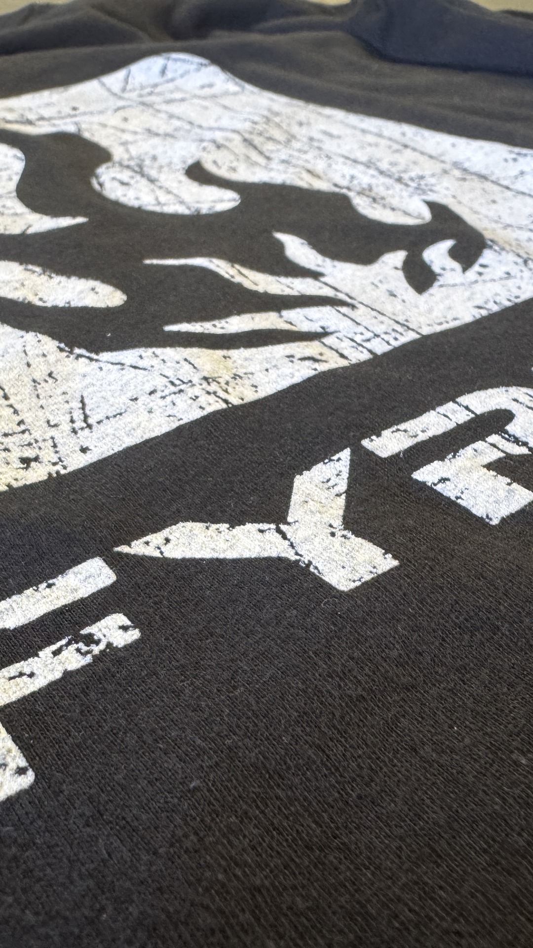 Close-up of a custom screen-printed t-shirt